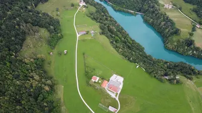 an aerial view of a park next to a river at Apartma Patricija for 2 in Tolmin