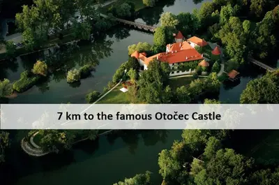 a house in the middle of a river with the words to thefamous at Vineyard Cottage Skatlar in Otočec