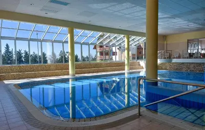 a large swimming pool in a large building at Stunning Apartment In Pohorje With Wifi in Pohorje