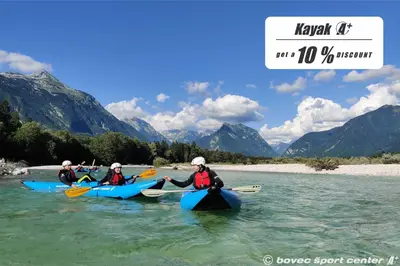 a group of people kayaking down a river at Glamping Virje in Bovec
