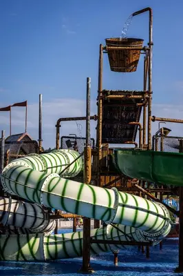 a row of water slides in the water at Apartment Adam & Eva, Near terme Olimia, Free Parking in Podčetrtek