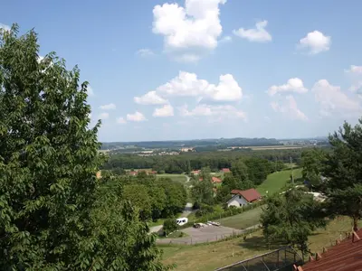 an overhead view of a town with trees and houses at Apartament VISOTA in Ptuj