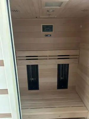 a closet in a house with a sign on the ceiling at Borl Apartment in Gradišča