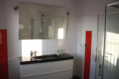 a bathroom with a sink and a mirror at Bella Vita in Postojna