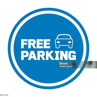 a free parking sign with a car in a circle at Apartman min & Ljubljana in Ljubljana