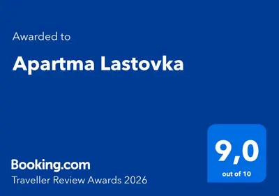 a blue sign with the wordsarma lastoxka on it at Apartma Lastovka in Moravske Toplice
