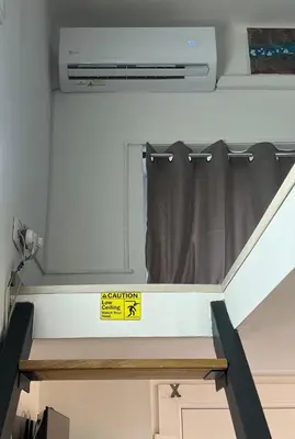 a window in an rv with a sign on it at Cosy Corner Vič in Ljubljana