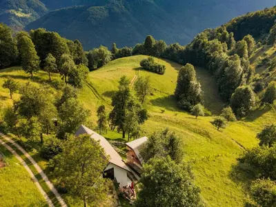 an aerial view of a house on a green hill at Nature Hideaway Holiday Homes with Sauna - One Bedroom Holiday Home in Slappe dʼIdria
