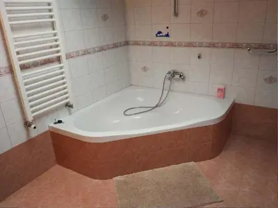 a bath tub with a faucet in a bathroom at Apartment mit eigener Sonnenterrasse by Interhome in Slappe dʼIdria