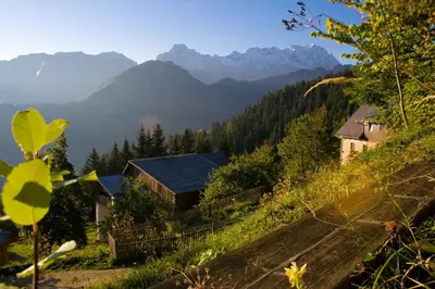 a view of a mountain with mountains in the background at Turistična kmetija Perk in Solčava