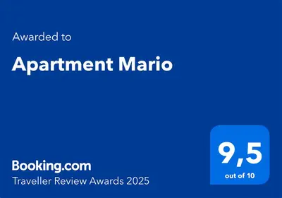 a blue sign that says appointment marino with the words travel review awards at Apartment Mario in Ptuj
