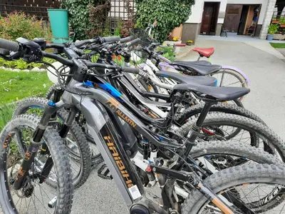 a row of bikes parked next to each other at Snežak (Snowman) in Bohinj