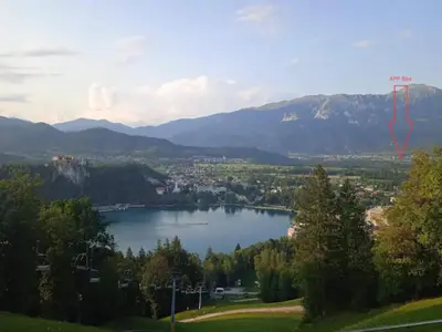 a view of a lake with mountains in the background at Apartment Bee near Bled in Zabreznica