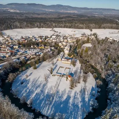 an aerial view of a town in the snow at Apartma Kolpa in Gradac