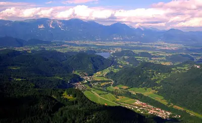 an aerial view of a valley with mountains and a lake at Pr Bevc in Bled