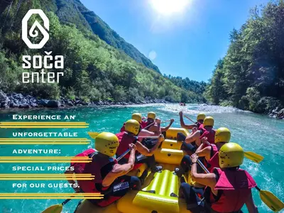 a group of people on a raft on a river at Retro apartments Kaninska vas in Bovec