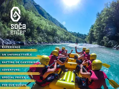 a group of people on a raft on a river at Vila Bovec Sunrise apartment with balcony in Bovec