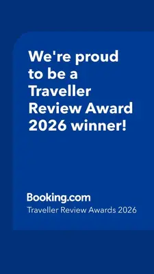 a blue sign that says were proud to be a traveller reviewagency winner at Apartma Petja in Moravske Toplice