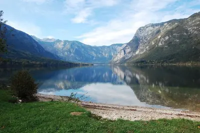 a view of a lake in the middle of a mountain at Iglica Apartments - First Floor in Bohinjska Bela